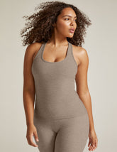 beige tank top.